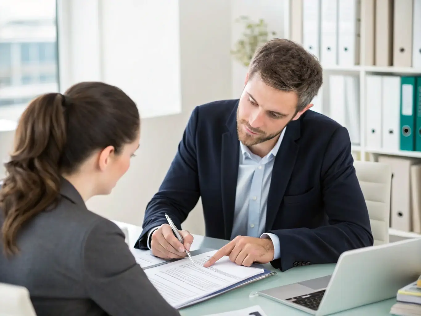 A CPA is having a one-on-one consultation with a client, providing personalized advice and guidance. The atmosphere is supportive and collaborative.